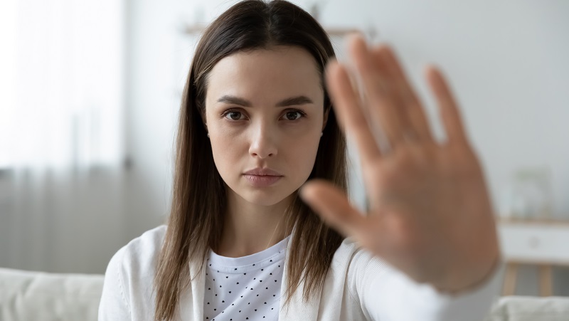 Woman rejects with her hand