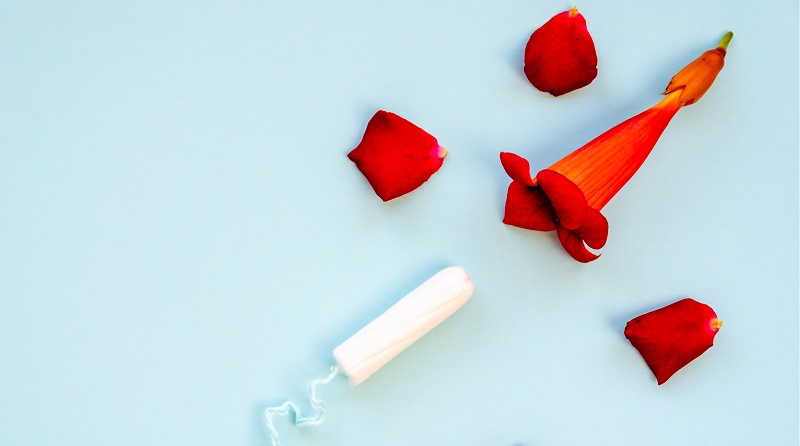 tampon and red petals
