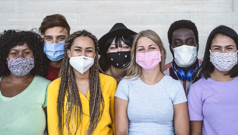 Group of young people with facemasks.