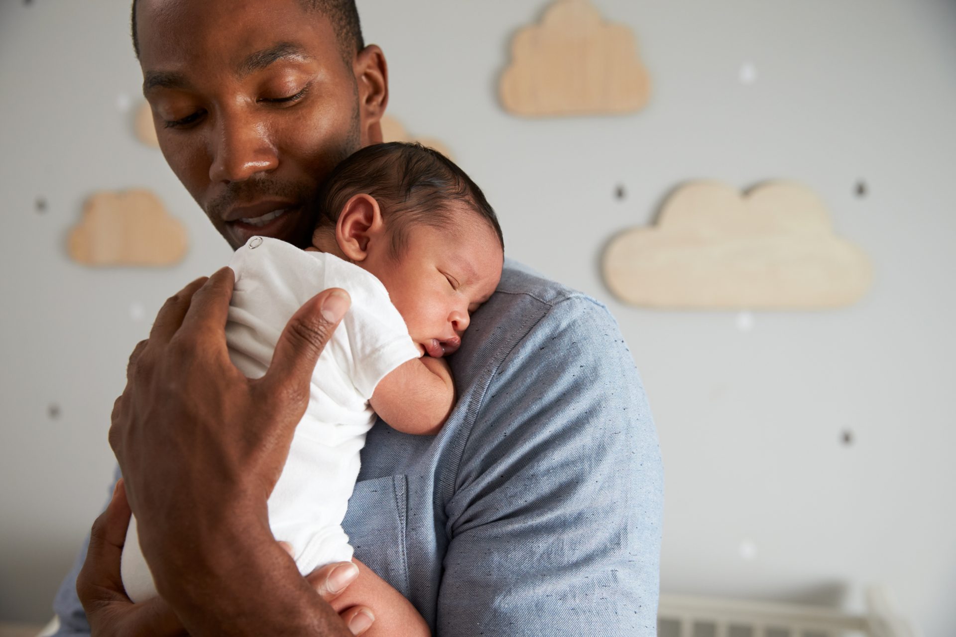 Father holding a baby